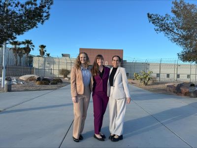 Professor Courtney Cross and two clinic students