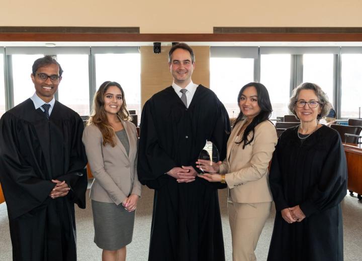 Photo of students and judges
